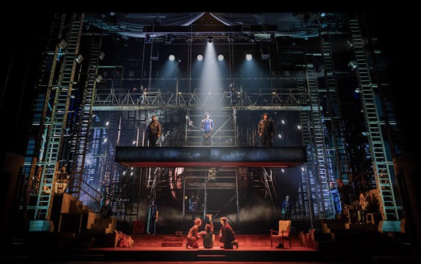 Stage performance of "The Last Ship" in Brisbane with actors on an industrial set.