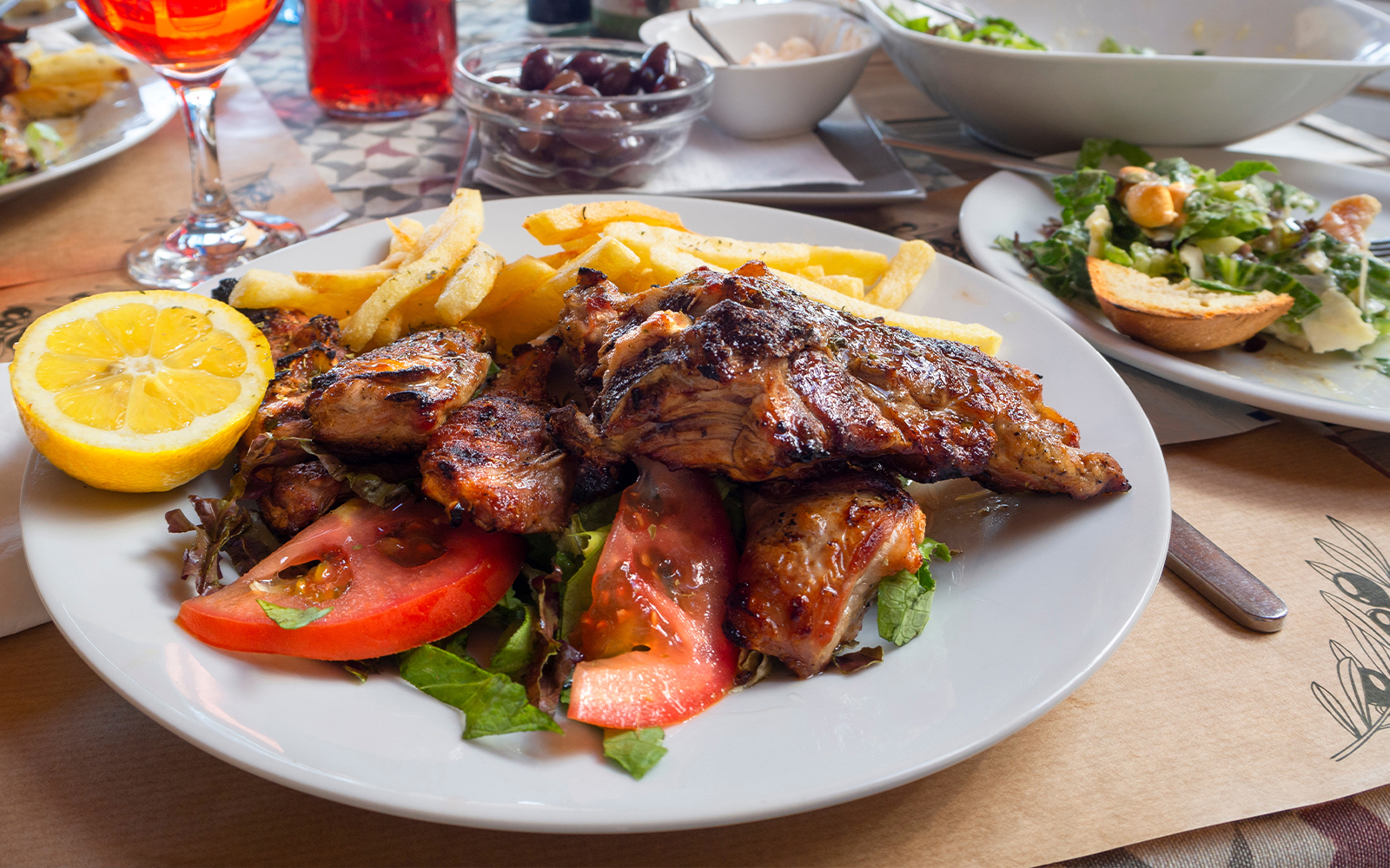Grilled chicken with fries and salad at Delphi Museum Cafe.