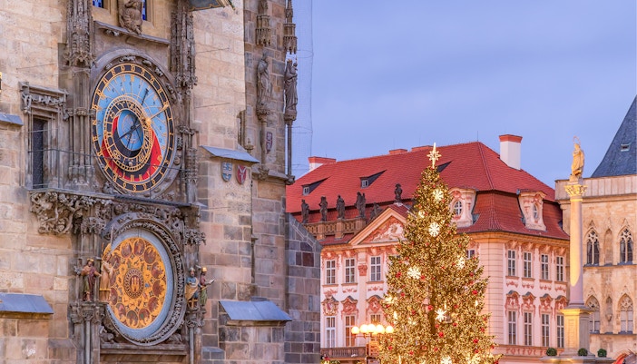 Prague Astronomical Tower illuminate during night time during Christmas