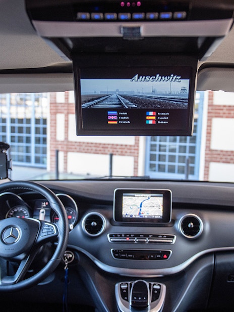 Mercedes interior with navigation screen, Krakow Airport private transfer service.