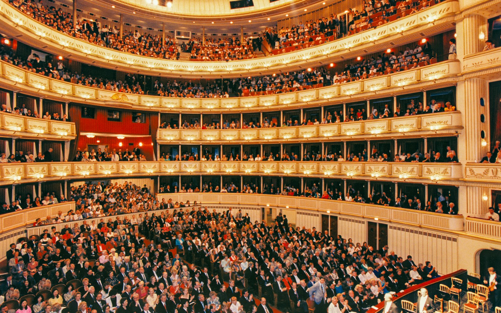 Audience and orchestra at Mozart concert in Vienna State Opera.