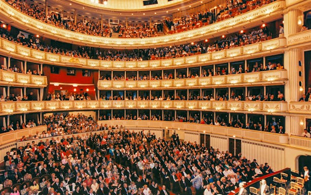 Audience and orchestra at Mozart concert in Vienna State Opera.