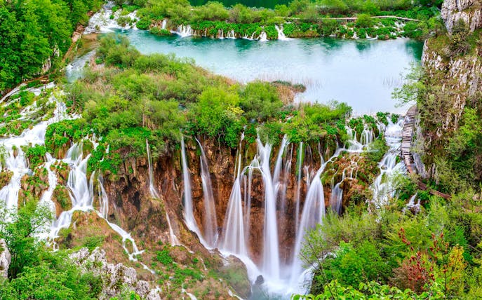 Waterfalls and lush greenery at Plitvice Lakes National Park, Croatia, on a tour from Split.