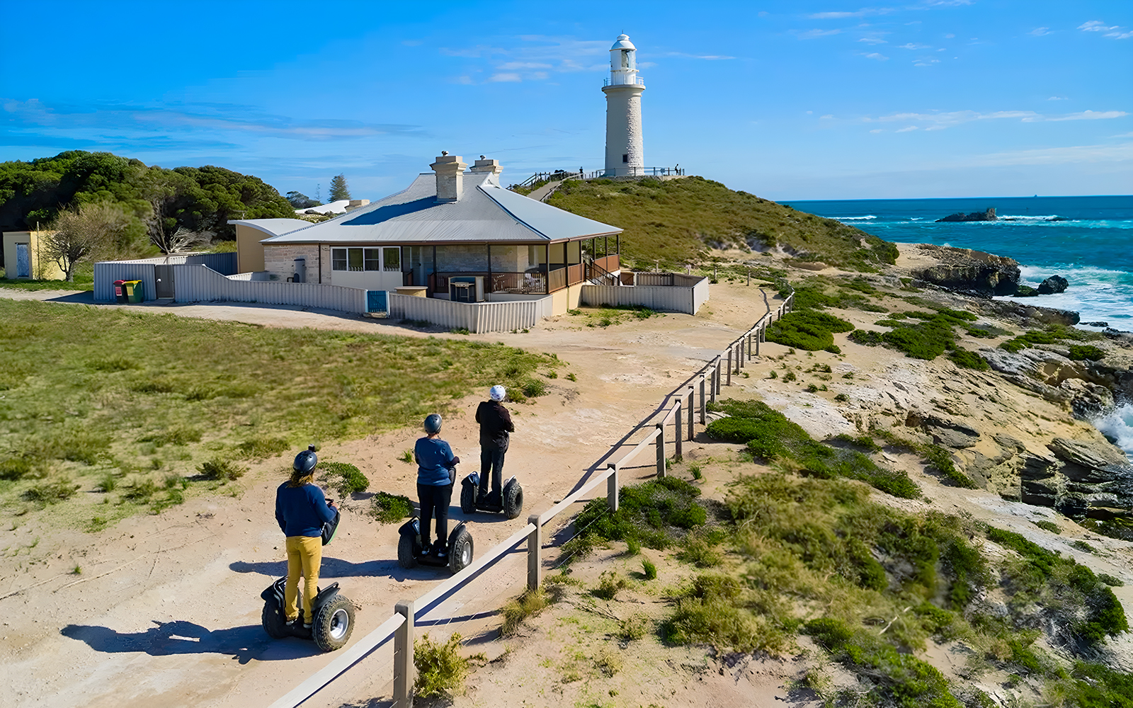 Tourist riding a Segway along a scenic path on Rottnest Island, Australia.