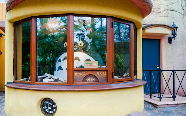 Totoro figure in Ghibli Museum window display, Tokyo.