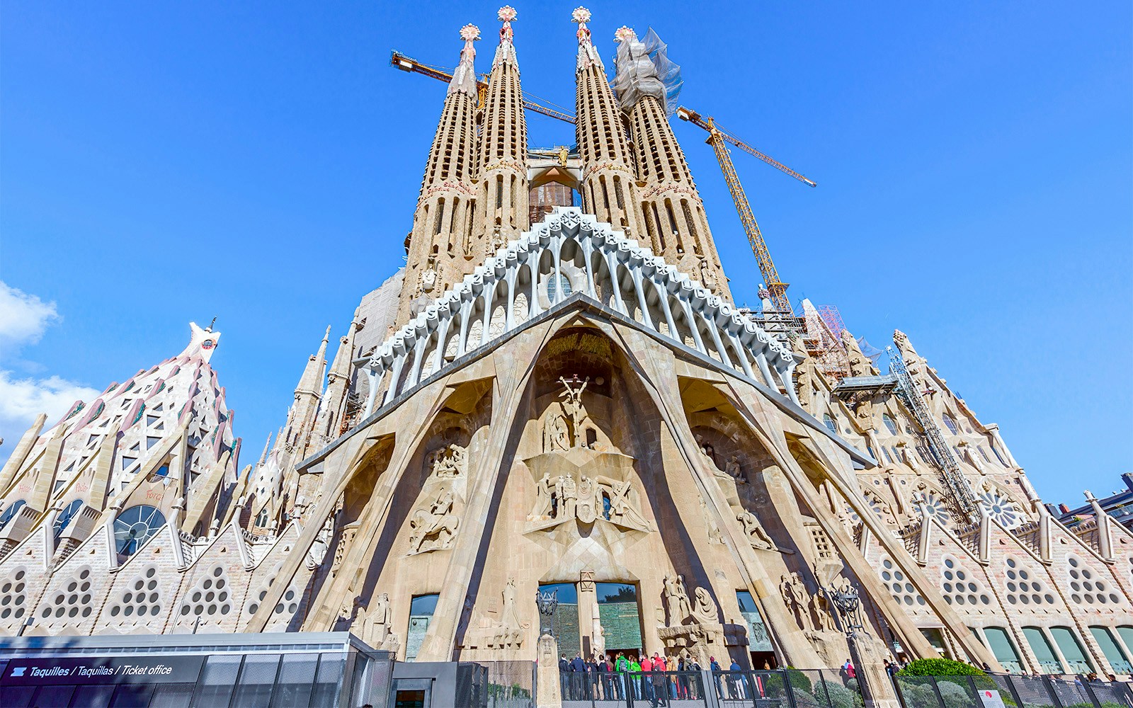 Sagrada Familia Passion Facade sculptures in Barcelona, Spain, showcasing intricate biblical scenes.