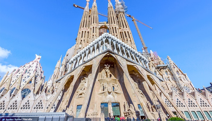 Sagrada Familia Passion Facade sculptures in Barcelona, Spain, showcasing intricate biblical scenes.