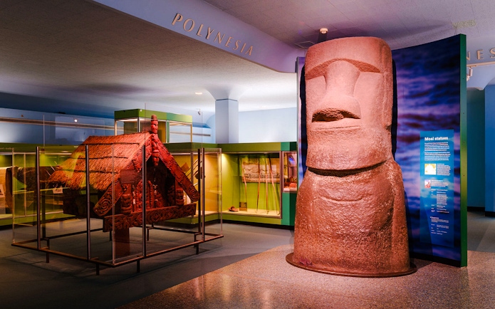 Moai statue and Polynesian artifacts at Margaret Mead Hall of Pacific Peoples, American Museum of Natural History.