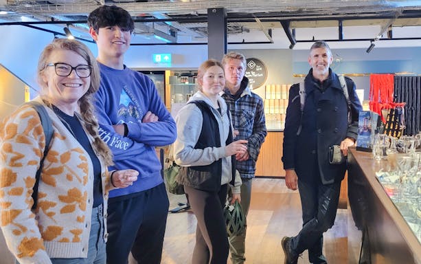 Guests enjoying whiskey tasting experience in Glasgow distillery.