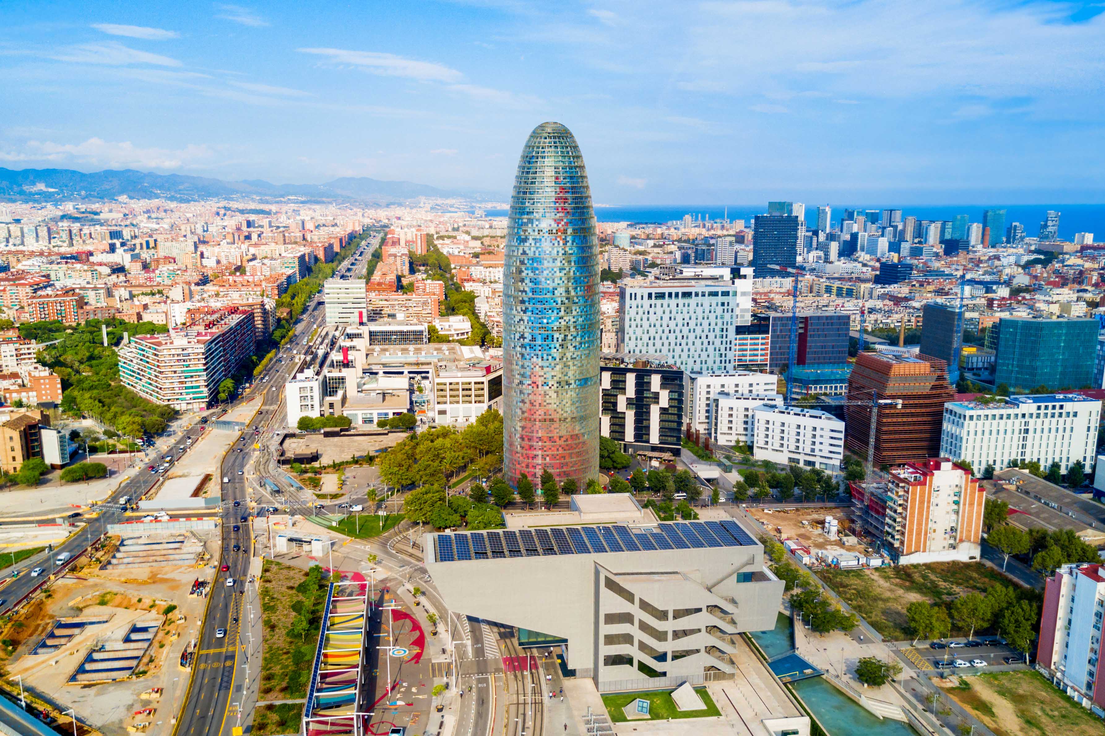 Aerial view of Glories Skyline Tower in Barcelona surrounded by cityscape.