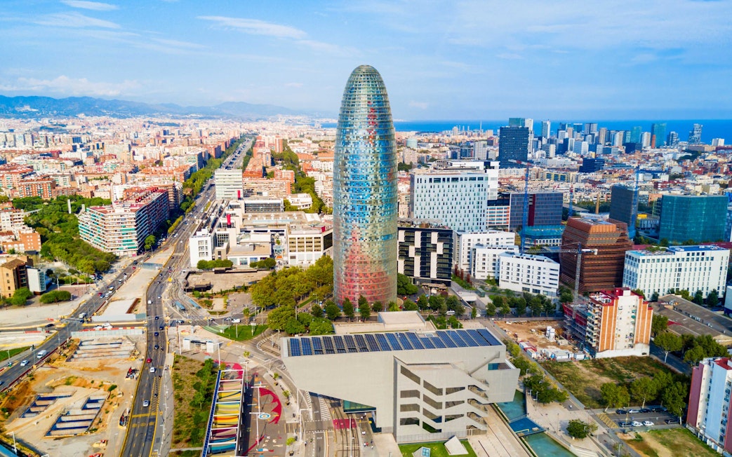 Aerial view of Glories Skyline Tower in Barcelona surrounded by cityscape.