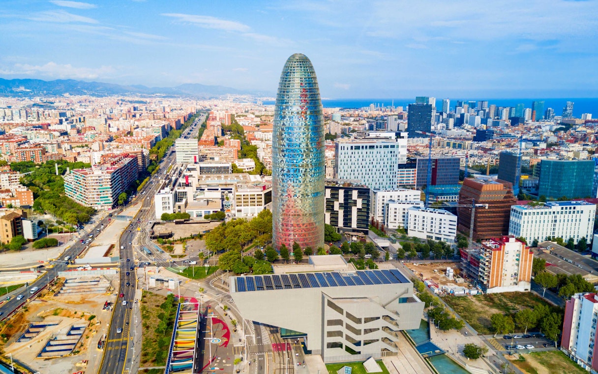 Aerial view of Glories Skyline Tower in Barcelona surrounded by cityscape.