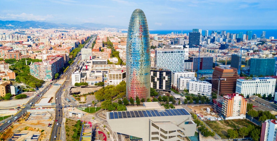 Aerial view of Glories Skyline Tower in Barcelona surrounded by cityscape.