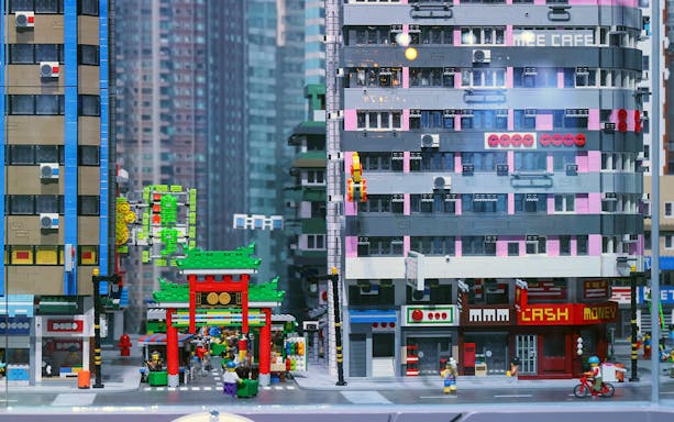 LEGO cityscape with colorful buildings and street scene at LEGOLAND® Discovery Centre Hong Kong.