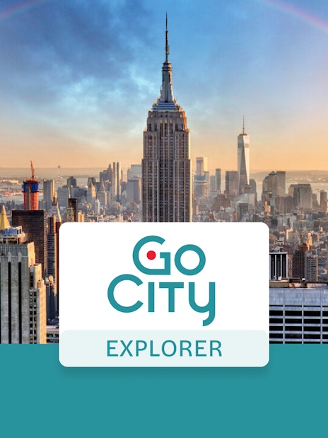 New York City skyline with Empire State Building and rainbow, promoting Go City Explorer Pass.
