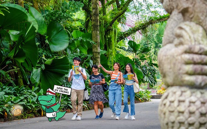 Group exploring lush garden during RANSACK PUZZLE HUNT: The Meltdown Menace.
