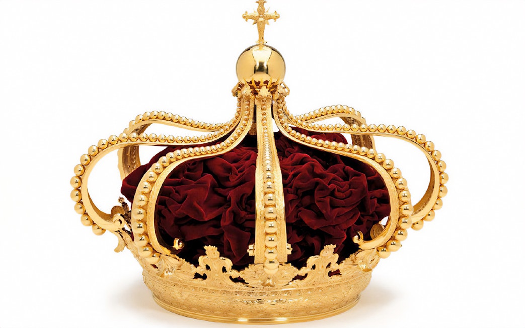 Golden crown with red velvet interior at Royal Treasure Museum.