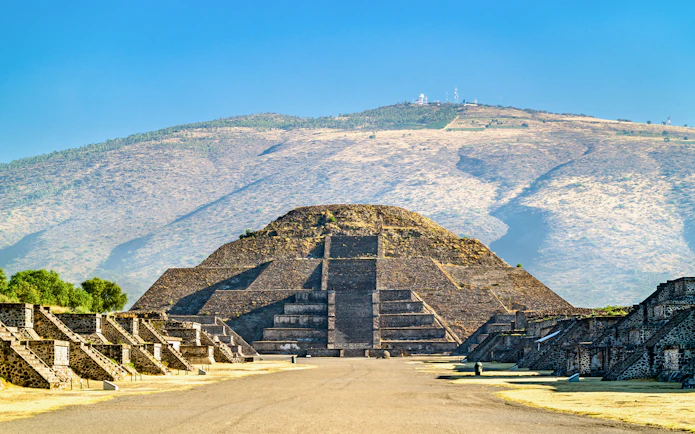 Pyramid of the Moon at Teotihuacan, Mexico, with surrounding ancient structures.