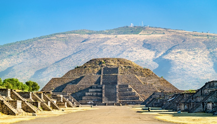 Pyramid of the Moon at Teotihuacan, Mexico, with surrounding ancient structures.