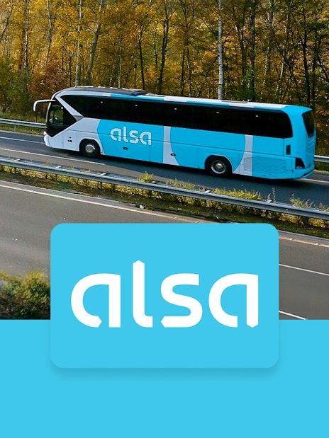 Alsa bus on highway, Granada Airport to Granada Bus Station route.