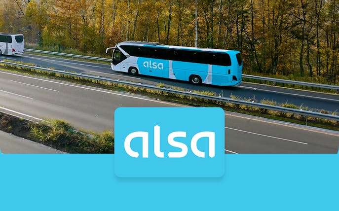 Alsa bus on highway, Granada Airport to Granada Bus Station route.