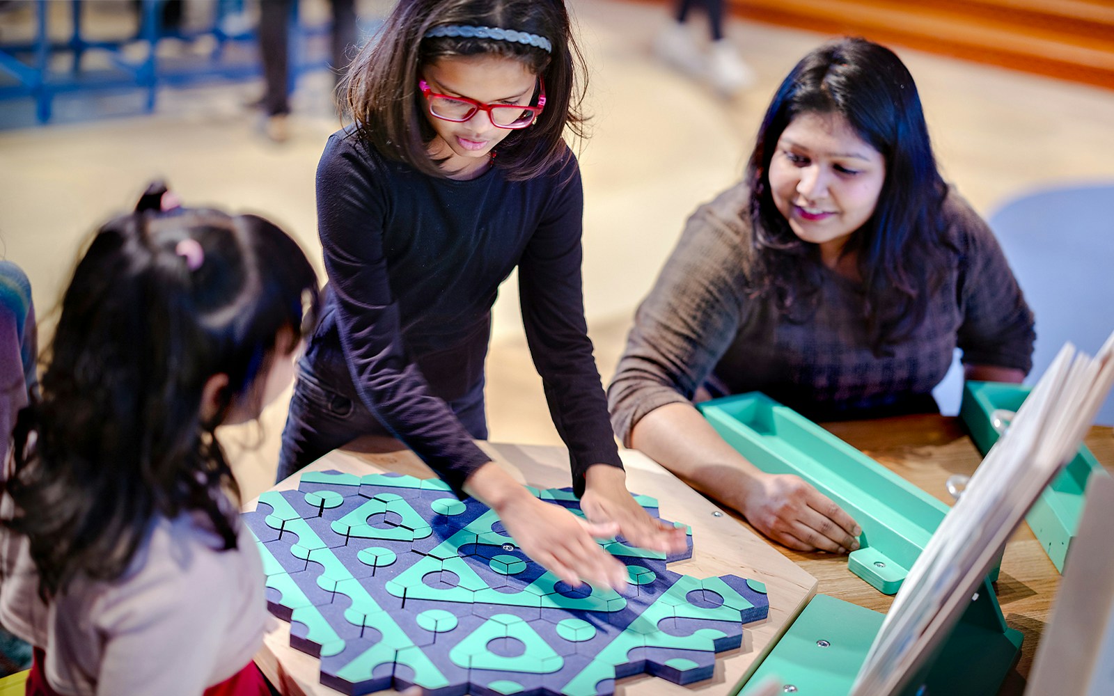 Visitors engaging in hands-on activities at NEMO Maker Space, Amsterdam.