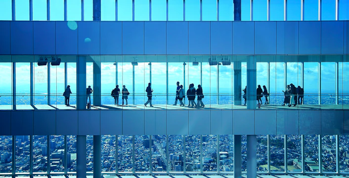 Visitors enjoying the view from Harukas 300 Observatory in Osaka, Japan.