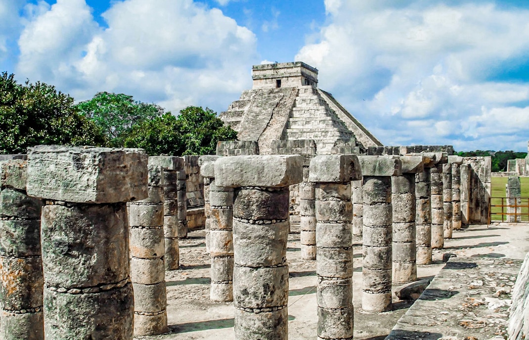 Chichen Itza temple and columns at sunrise, Yucatan, Mexico.