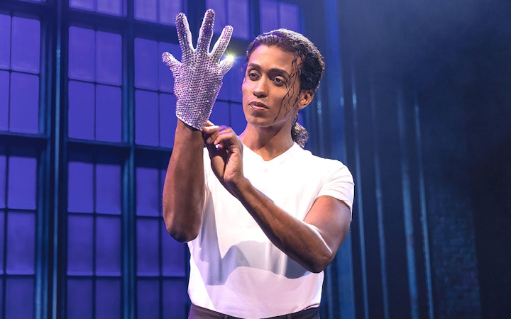 Performer wearing a sparkling glove in MJ Das Musical.
