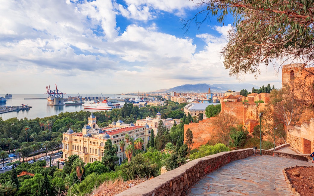 View of Malaga cityscape and harbor from Alcazaba Castle.