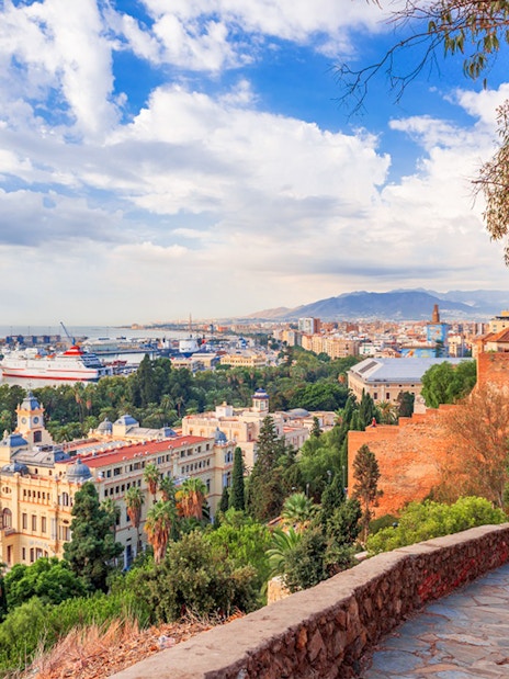 View of Malaga cityscape and harbor from Alcazaba Castle.