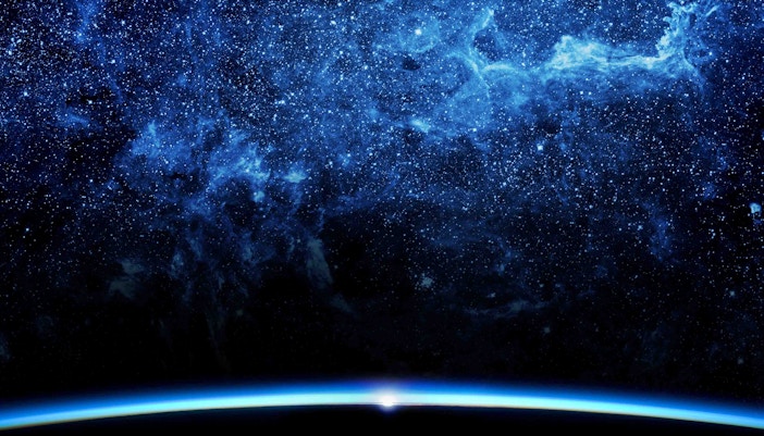 Planetarium dome with starry night sky projection.