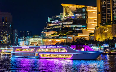 Bangkok Chaophraya dinner cruise passing Iconsiam at night.