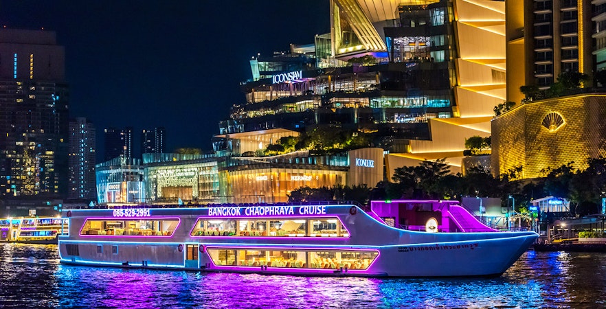Bangkok Chaophraya dinner cruise passing Iconsiam at night.