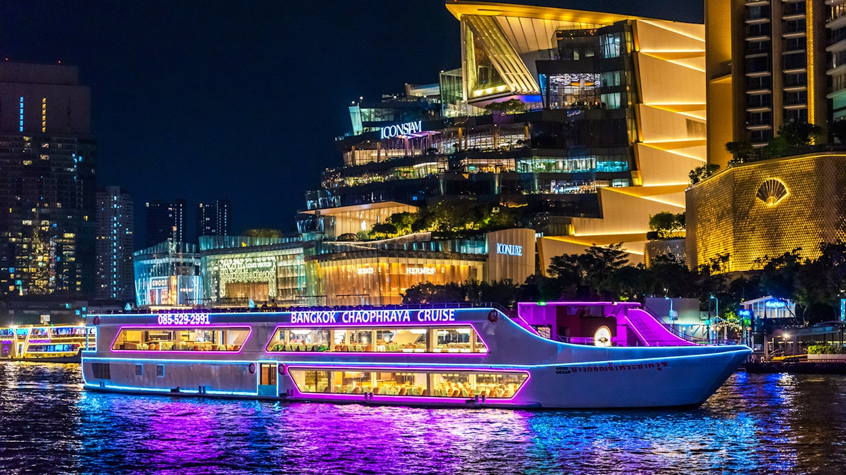 Bangkok Chaophraya dinner cruise passing Iconsiam at night.