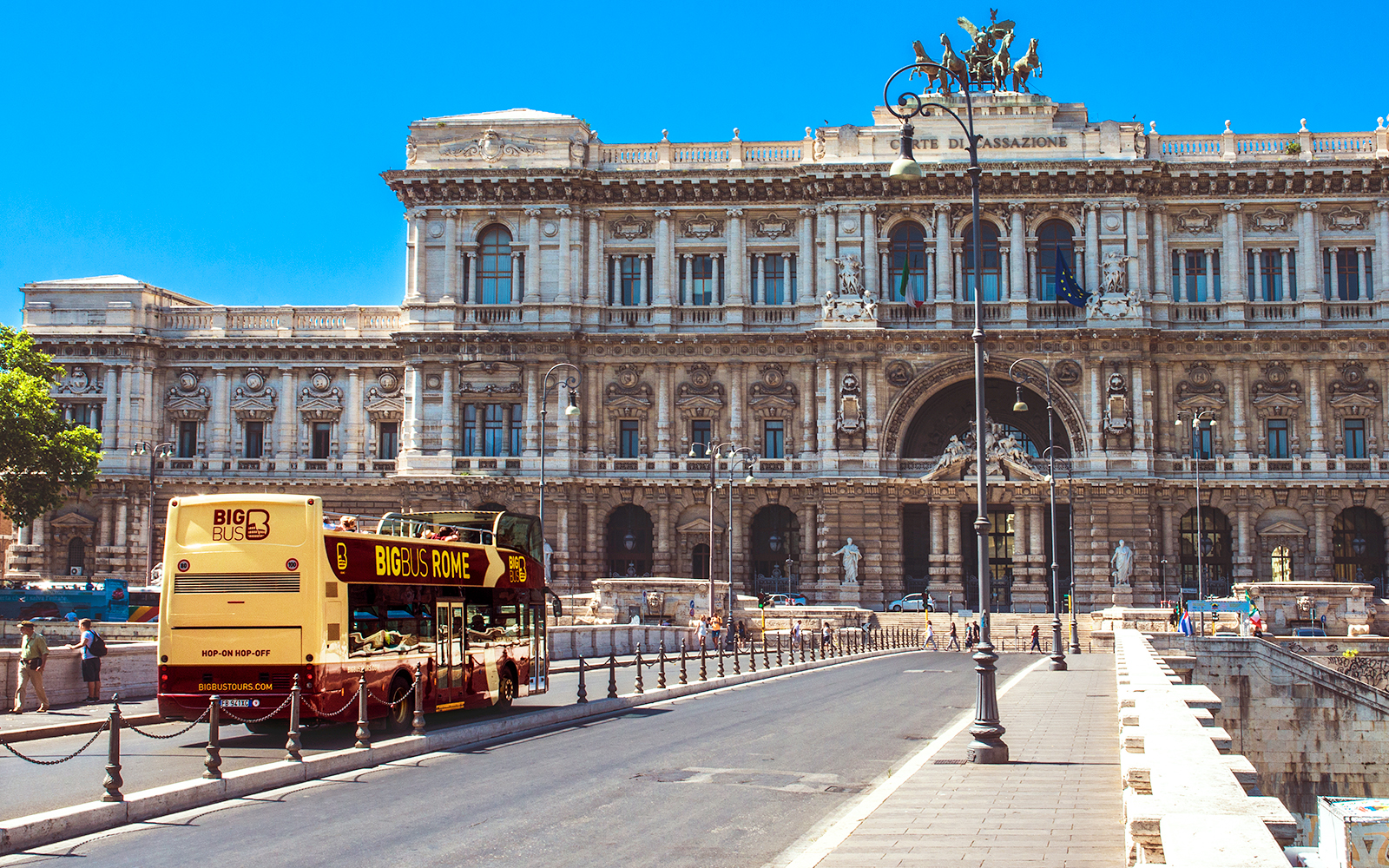 Big Bus Rome tour passing by the Palace of Justice in Rome, Italy.