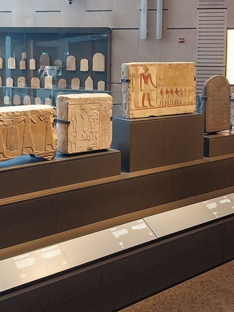 Ancient Egyptian artifacts displayed at the Grand Egyptian Museum.
