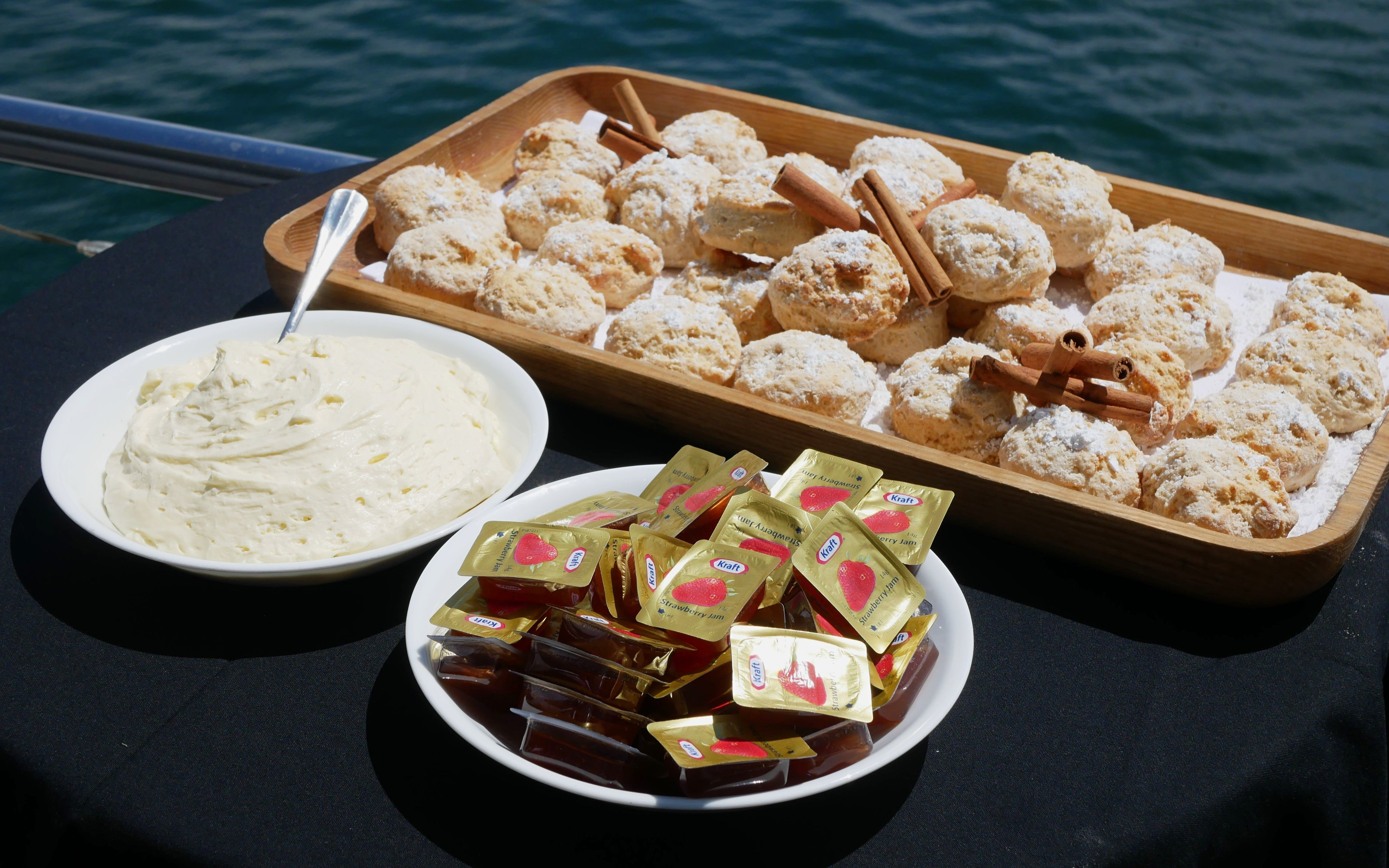 Traditional British scones with cream and jam on Sydney Harbour cruise.