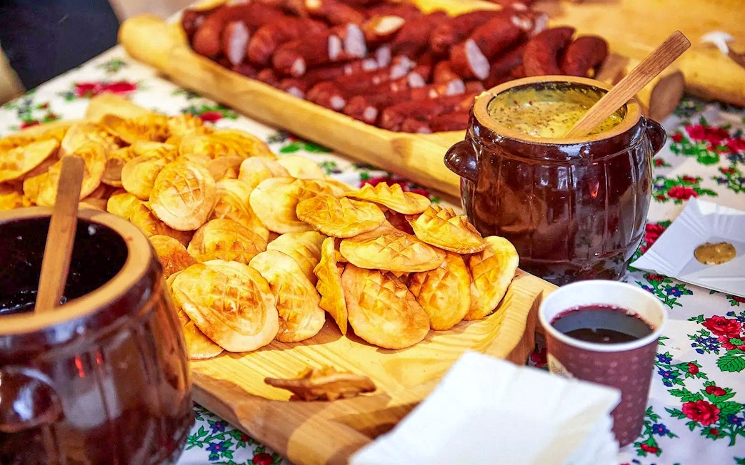 Oscypek cheese with cranberry sauce on a table during Zakopane quad biking adventure.
