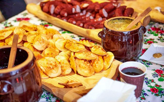 Oscypek cheese with cranberry sauce on a table during Zakopane quad biking adventure.