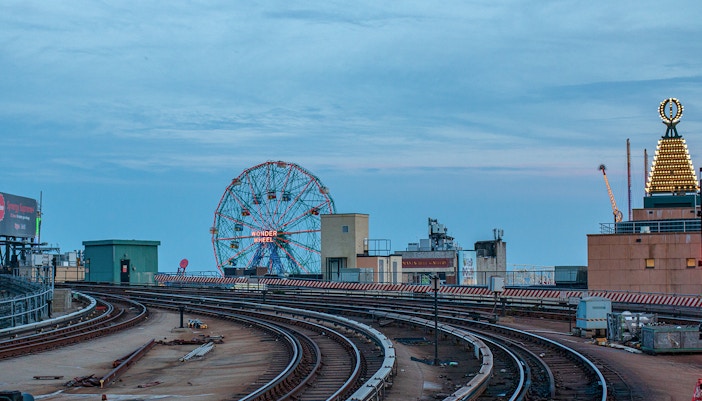 Night lights illuminated on ferris wheel at Coney Island