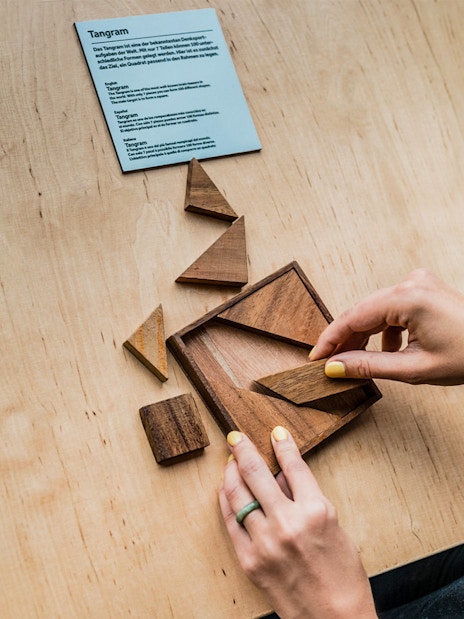 Tangram puzzle being solved at Illuseum Berlin.