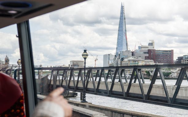 View of the Shard from a London sightseeing bus crossing the Thames.