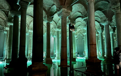 Basilica Cistern's illuminated columns in Istanbul, part of skip-the-line tour package.