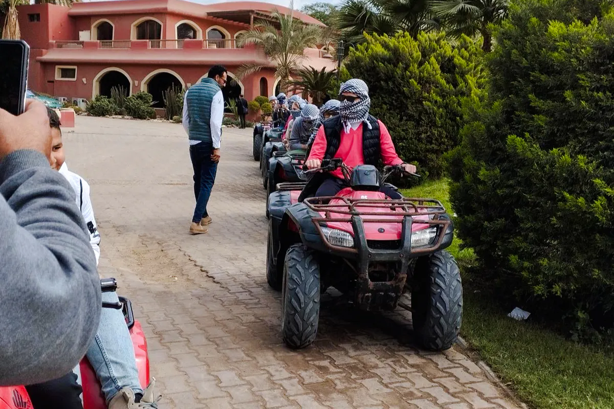 Quad bike riders preparing for a sunrise safari at Saqqara, Cairo.