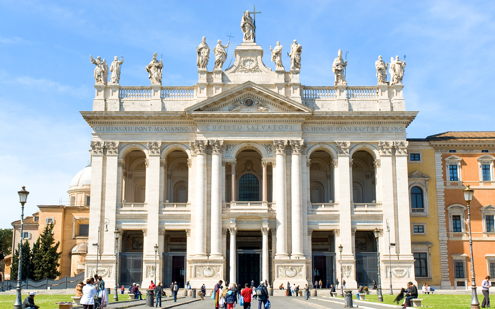 San Giovanni Laterano facade with intricate sculptures and columns in Rome, Italy.