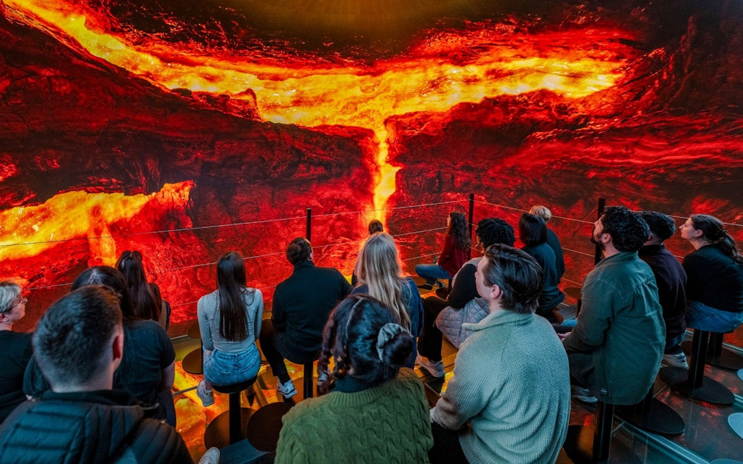 Guests viewing a lava exhibit inside Perlan Museum, Reykjavik.