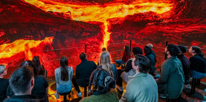Guests viewing a lava exhibit inside Perlan Museum, Reykjavik.