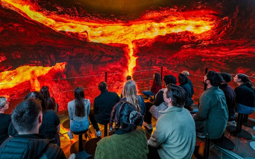 Guests viewing a lava exhibit inside Perlan Museum, Reykjavik.