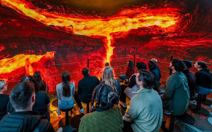 Guests viewing a lava exhibit inside Perlan Museum, Reykjavik.